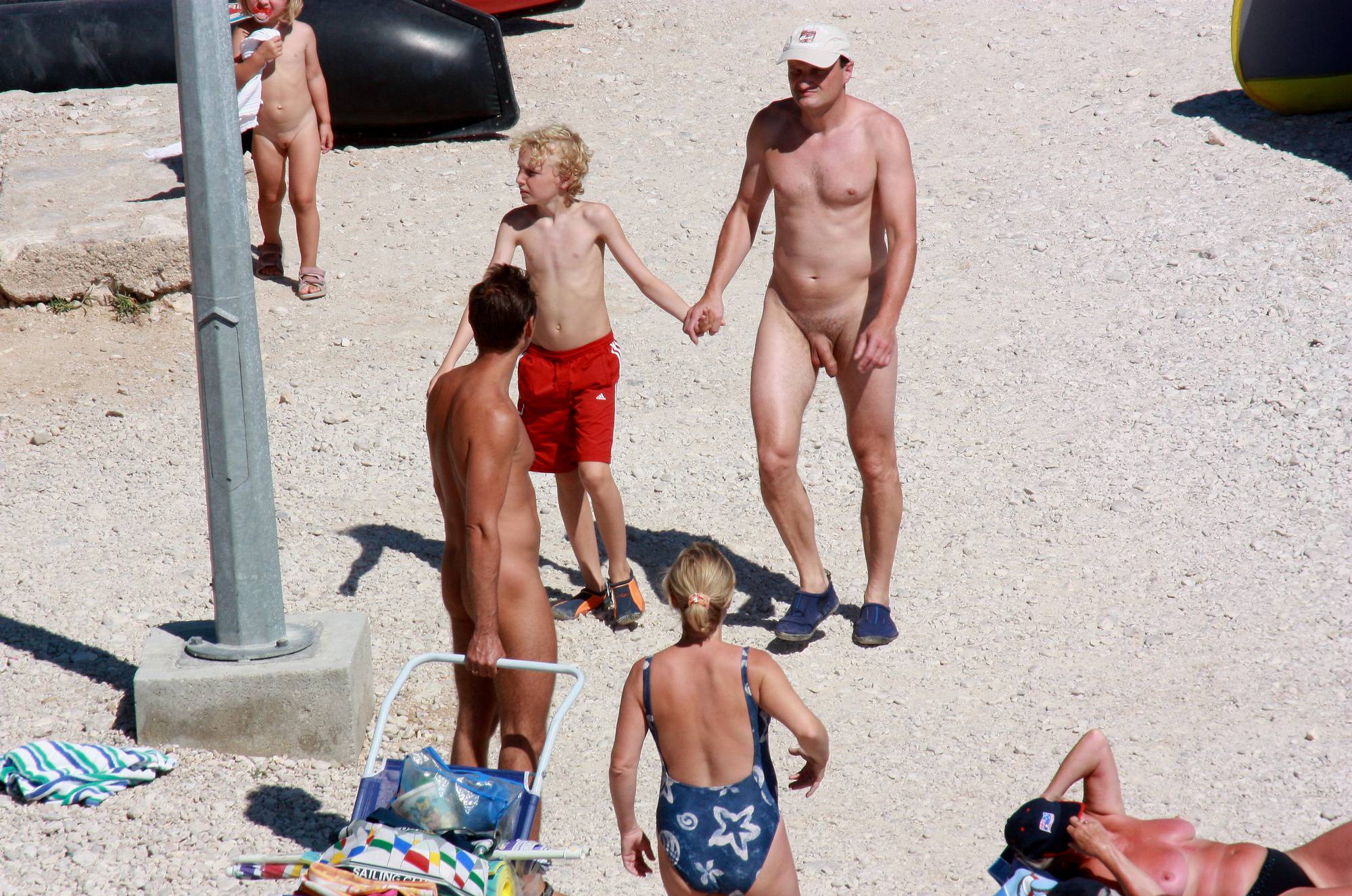 Nudist Pictures Boy and His Dad Beach Walk - 2