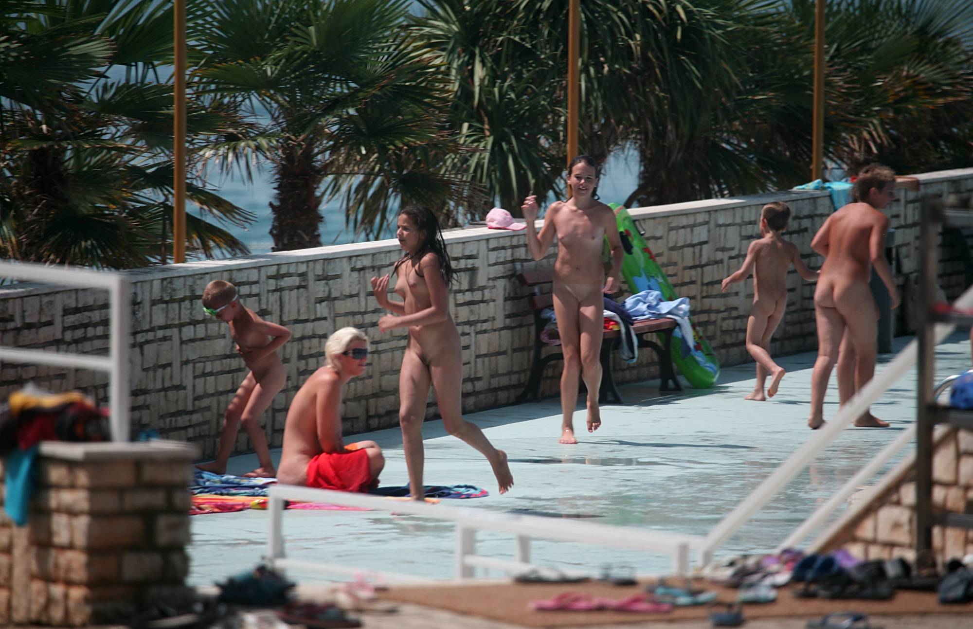 Nudist Pics From the Pool to Walkway - 1